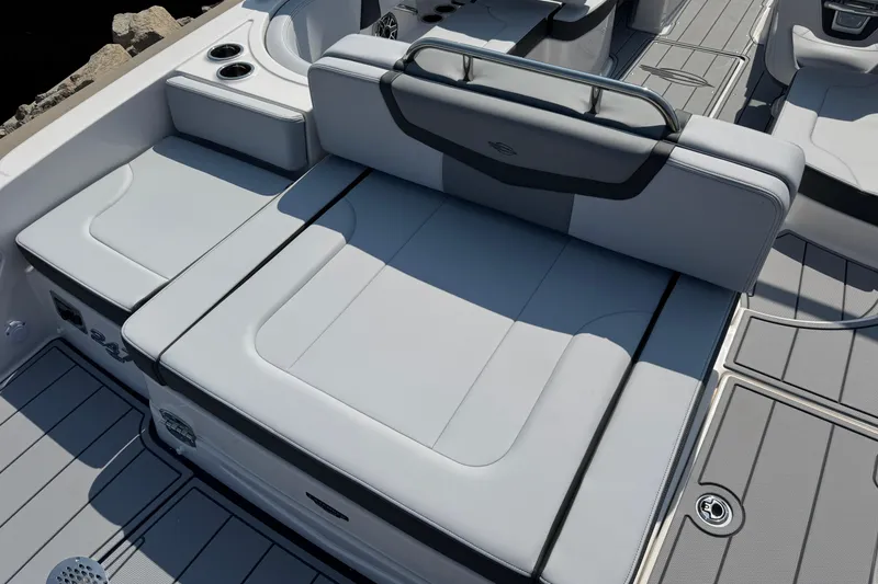 Slide: The Image of 2025 Chaparral 247 SSX boat interior with sleek gray seating and modern design. - 31