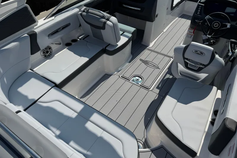 Slide: The Image of 2025 Chaparral 247 SSX boat interior with sleek seating and modern design. - 34