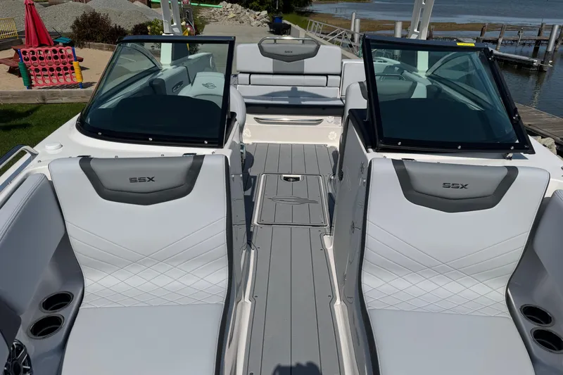 Slide: The Image of 2025 Chaparral 247 SSX boat interior with sleek seating and modern design. - 38