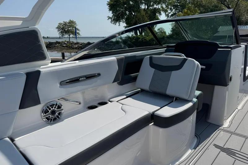 Slide: The Image of 2025 Chaparral 247 SSX boat interior with sleek seating and modern design. - 9