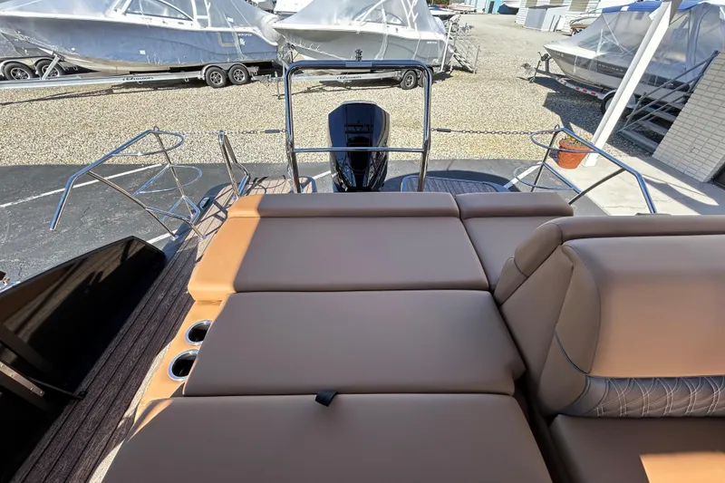 Slide: The Image of 2026 Harris FloteBote Cruiser 230 SL with luxurious seating and sleek design. - 14