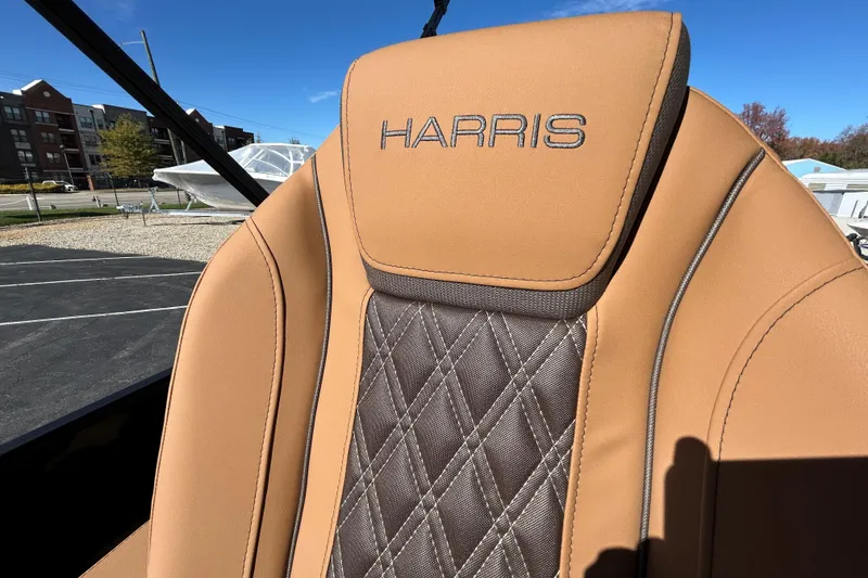 Slide: The Image of Luxurious tan seat of 2026 Harris FloteBote Cruiser 230 SL with diamond stitching. - 25
