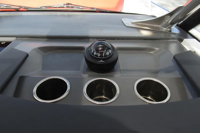 Slide: The Image of Dashboard of 2024 Nimbus T8 with compass and three cup holders. - 16