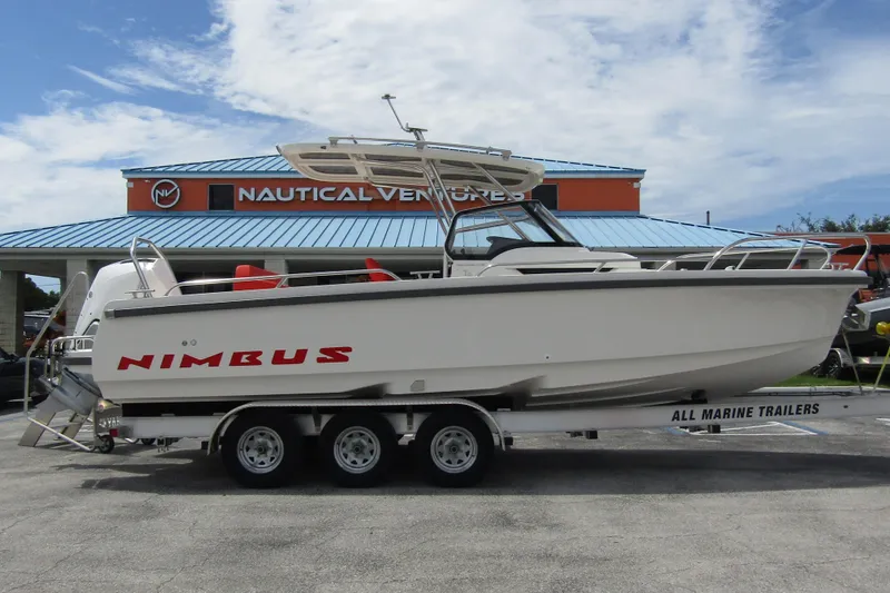 Slide: The Image of 2024 Nimbus T8 boat on trailer at Nautical Ventures dealership. - 4