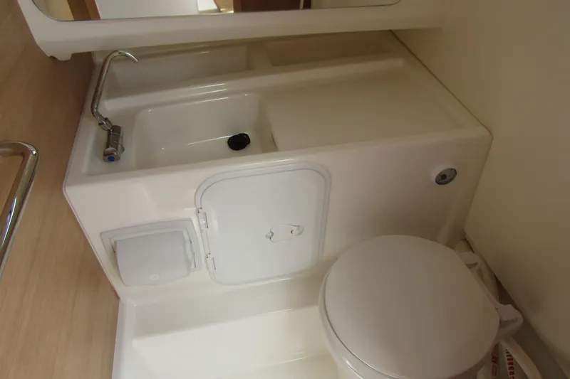 Slide: The Image of Compact bathroom in 2024 Nimbus T8 boat with sink and toilet. - 23