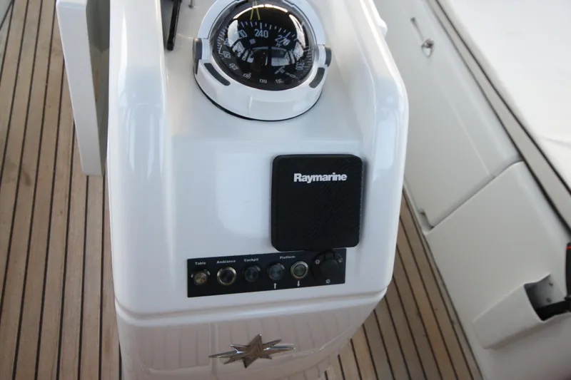 Slide: The Image of Compass and Raymarine controls on Jeanneau Sun Odyssey 410, 2022 model yacht. - 10