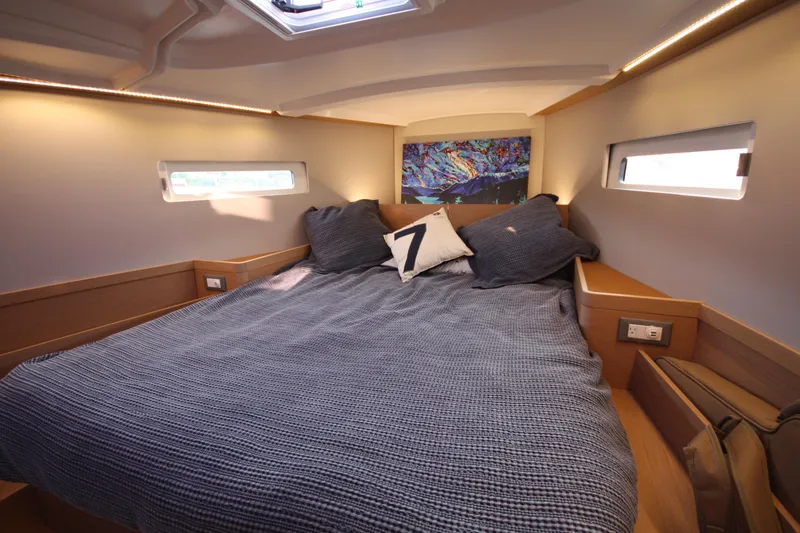 Slide: The Image of Luxurious cabin interior of 2022 Jeanneau Sun Odyssey 410 sailboat. - 18