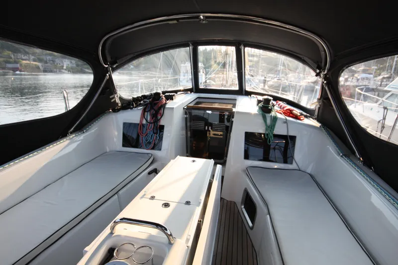 Slide: The Image of 2022 Jeanneau Sun Odyssey 410 cockpit with seating and sailing equipment. - 4