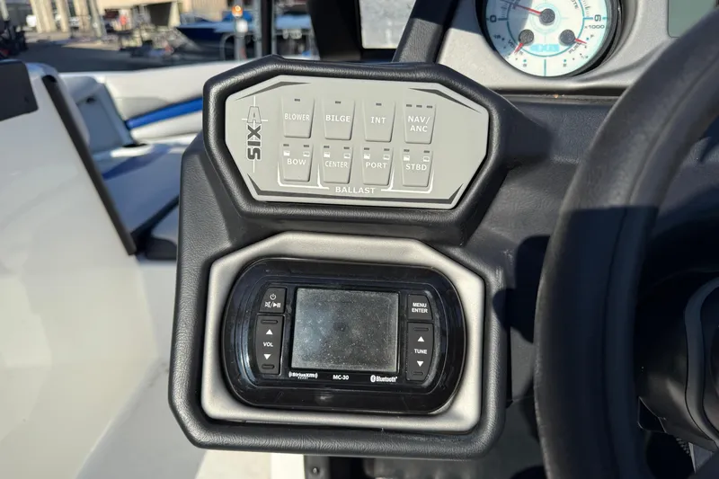 Slide: The Image of Control panel of a 2018 Axis A20 boat with ballast and audio system. - 14