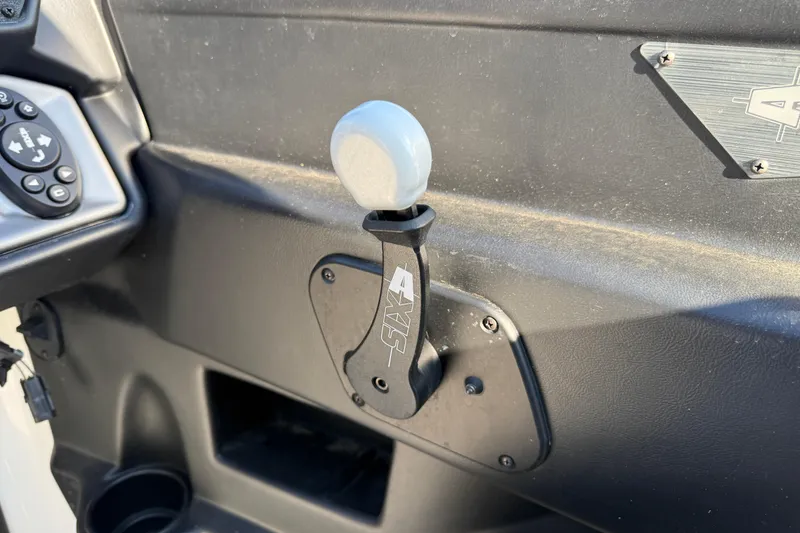 Slide: The Image of 2018 Axis A20 boat throttle control with dashboard details. - 17