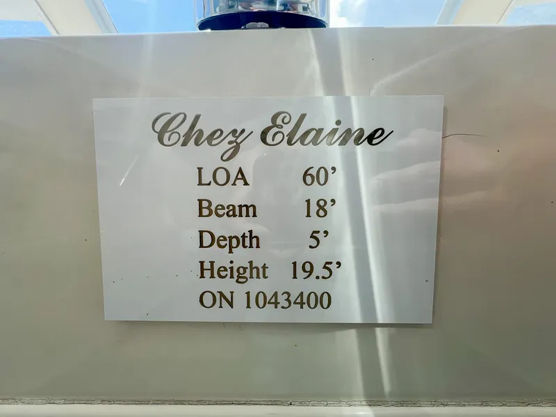 Slide: The Image of Plaque on Viking 60 Cockpit Sport Yacht, 1996, displaying dimensions and registration number. - 20