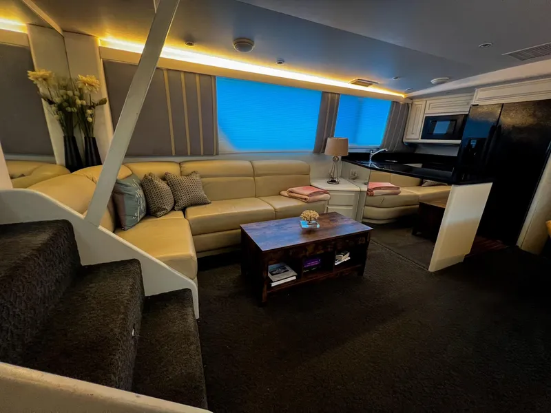 Slide: The Image of Luxurious interior of 1996 Viking 60 Cockpit Sport Yacht with modern furnishings and ambient lighting. - 25