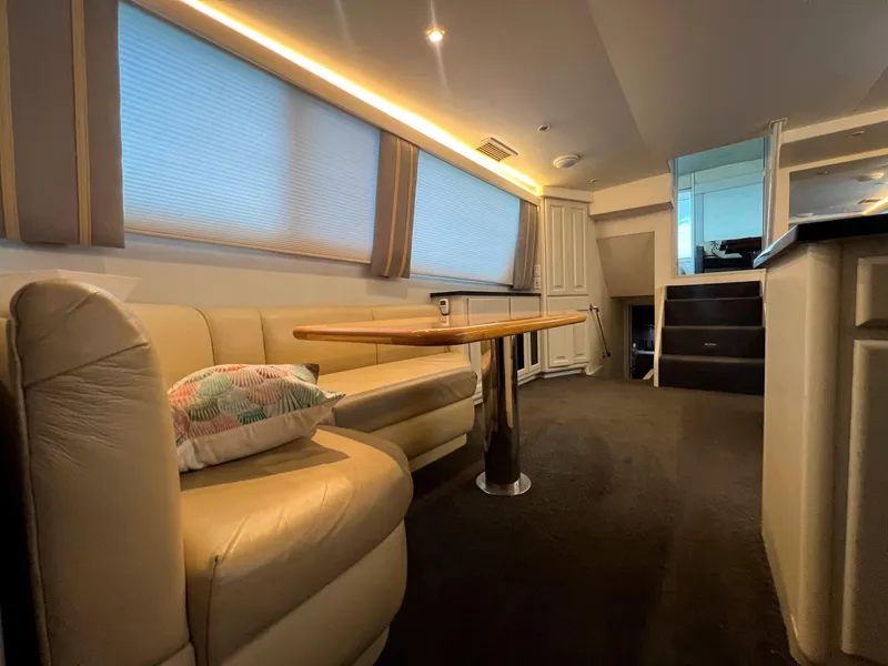 Slide: The Image of Luxurious interior of 1996 Viking 60 Cockpit Sport Yacht with plush seating and elegant decor. - 29