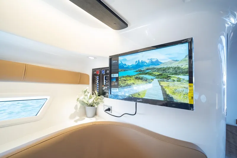 Slide: The Image of Luxurious interior of 2026 Hanover 305 yacht with TV and scenic view. - 34