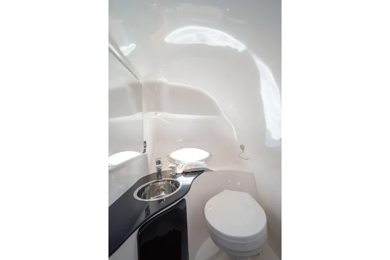 Slide: The Image of Modern bathroom interior in Hanover 305, 2026 model, featuring sleek sink and toilet design. - 36