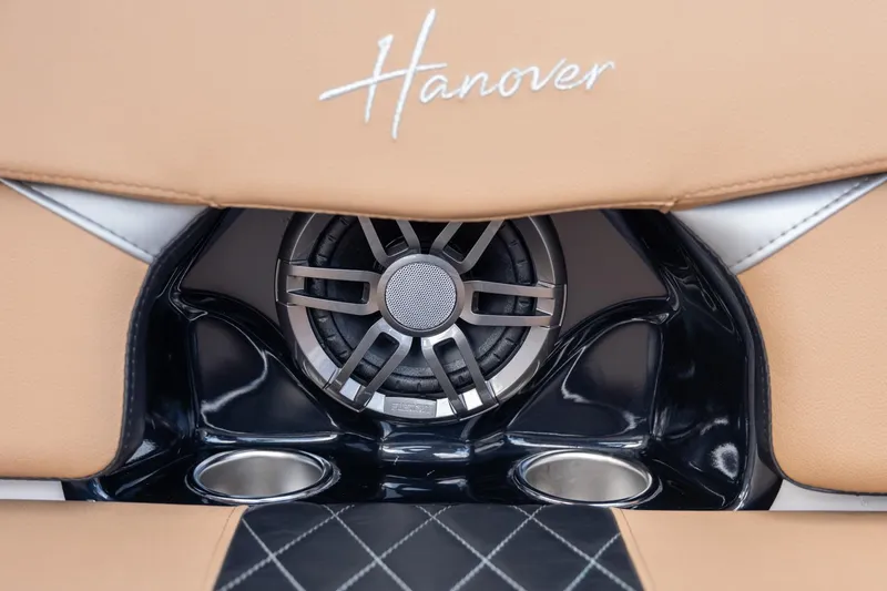Slide: The Image of Luxurious Hanover 305 interior with premium speaker and cup holders, 2026 model. - 38