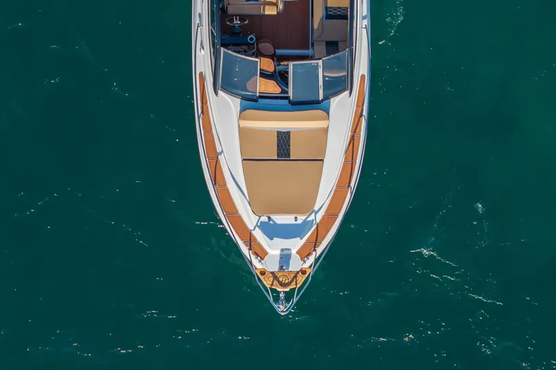 Slide: The Image of Top view of 2026 Hanover 305 yacht on clear blue water. - 6