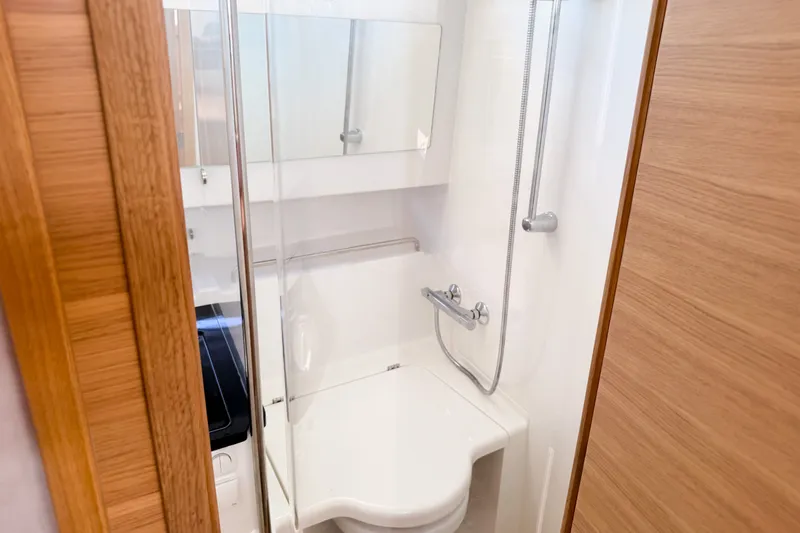 Slide: The Image of Compact bathroom in 2025 Nimbus Tender 11 boat with shower and toilet. - 19