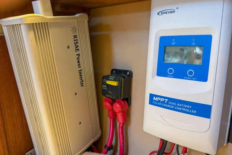 Slide: The Image of KISAE power inverter and MPPT solar charge controller in 1989 Island Packet 31 yacht. - 46