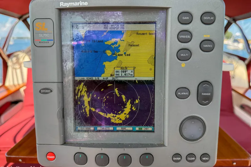 Slide: The Image of Raymarine SL70C radar display on 1989 Island Packet 31 sailboat, showing Cape Cod navigation map. - 52