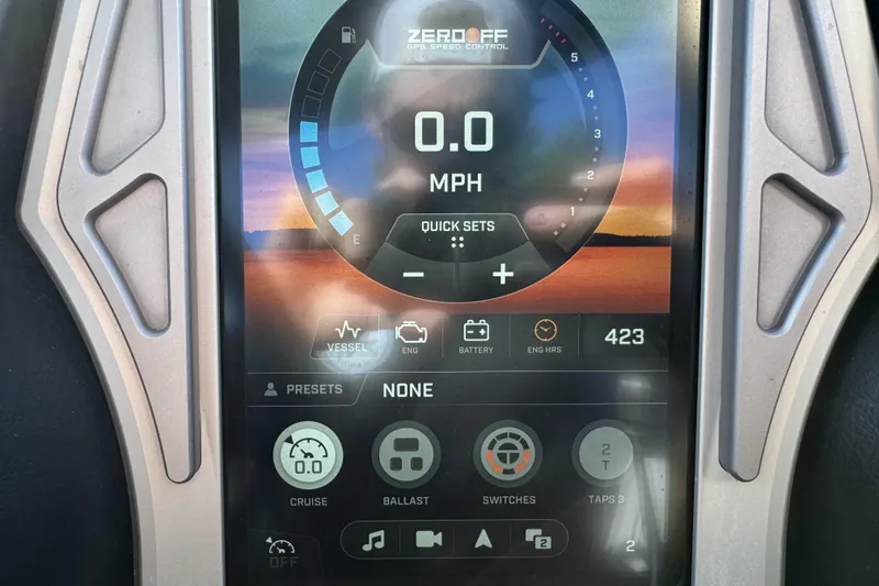 Slide: The Image of 2019 Tigé ZX5 dashboard display showing speed, engine hours, and control settings. - 7