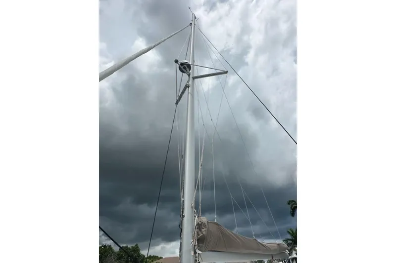 Slide: The Image of Mast of 2017 Fountaine Pajot Lucia 40 sailboat against stormy sky. - 15