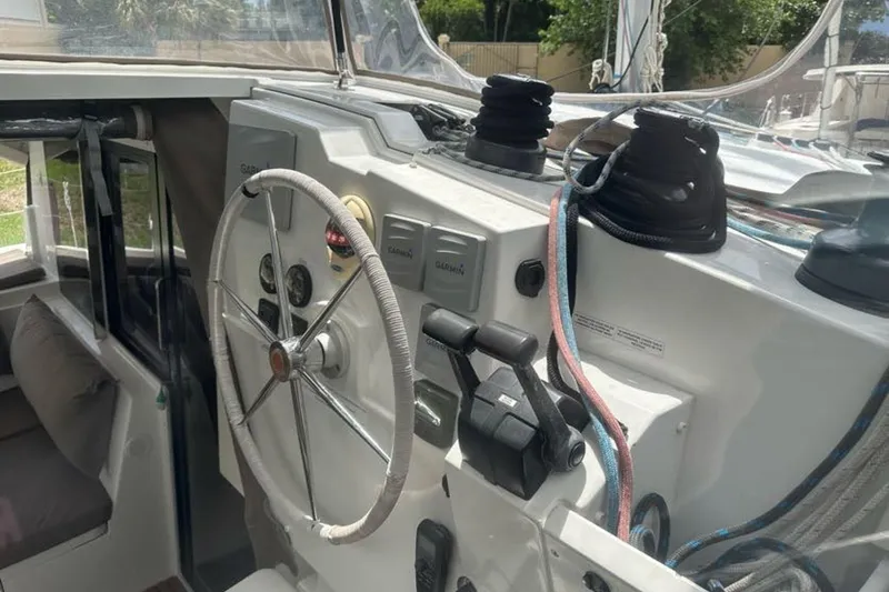 Slide: The Image of Helm of 2017 Fountaine Pajot Lucia 40 catamaran with steering wheel and control panel. - 22