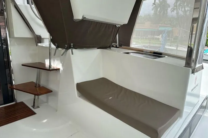 Slide: The Image of 2017 Fountaine Pajot Lucia 40 yacht interior with seating and wooden steps. - 42