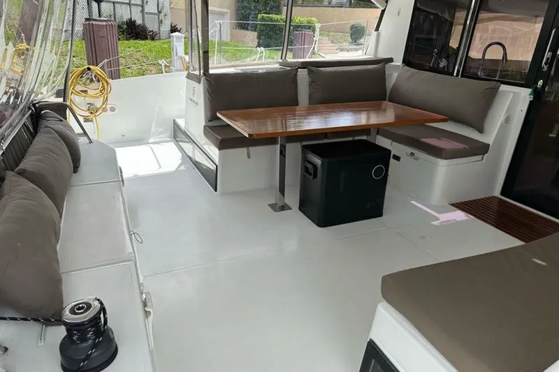 Slide: The Image of 2017 Fountaine Pajot Lucia 40 yacht interior with seating and dining area. - 43