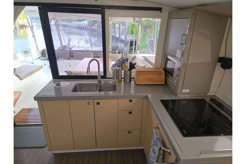 Slide: The Image of Modern kitchen interior of 2017 Fountaine Pajot Lucia 40 catamaran with sleek design. - 46