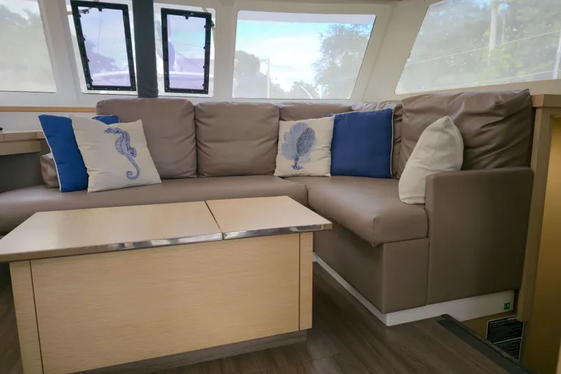 Slide: The Image of Interior of 2017 Fountaine Pajot Lucia 40 yacht with cozy seating and decorative pillows. - 51