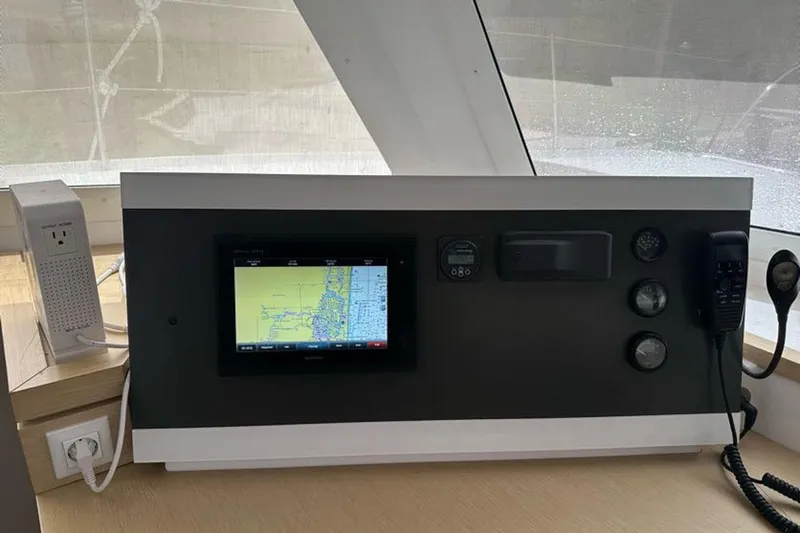 Slide: The Image of Navigation panel of 2017 Fountaine Pajot Lucia 40 catamaran with electronic display and controls. - 54