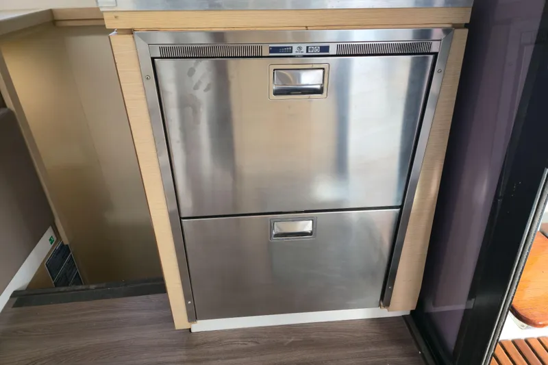 Slide: The Image of Stainless steel double-drawer fridge in 2017 Fountaine Pajot Lucia 40 yacht interior. - 64