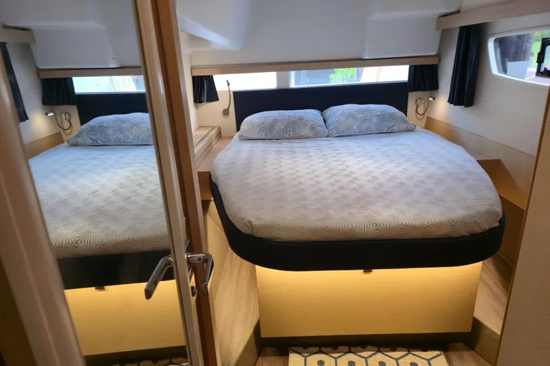 Slide: The Image of Luxurious bedroom interior of 2017 Fountaine Pajot Lucia 40 catamaran with cozy bedding. - 68