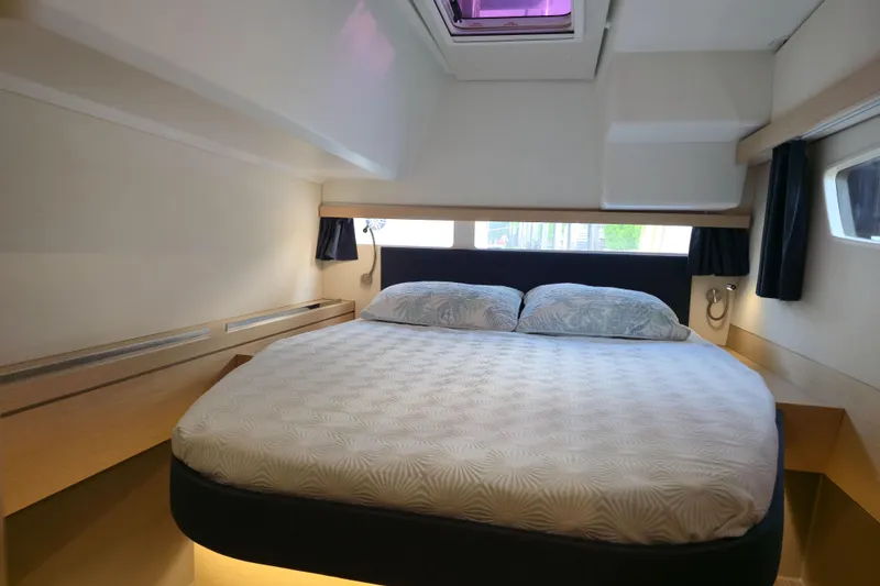 Slide: The Image of Luxurious cabin interior of 2017 Fountaine Pajot Lucia 40 catamaran with cozy bed and modern design. - 70