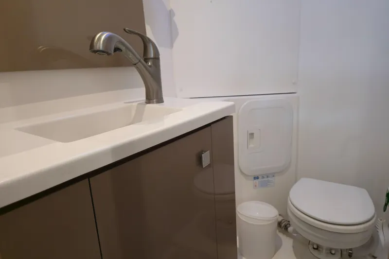 Slide: The Image of Bathroom interior of 2017 Fountaine Pajot Lucia 40 catamaran with sink and toilet. - 72