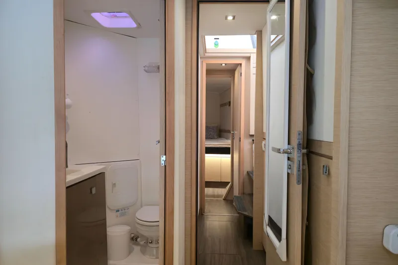 Slide: The Image of 2017 Fountaine Pajot Lucia 40 interior with bathroom and cabin view. - 73