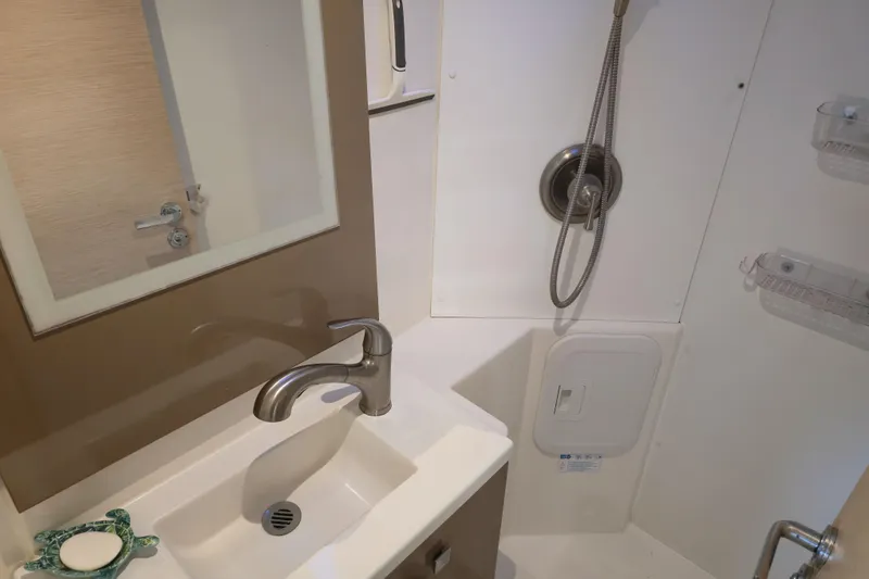 Slide: The Image of Bathroom interior of 2017 Fountaine Pajot Lucia 40 catamaran, featuring sink and shower. - 77