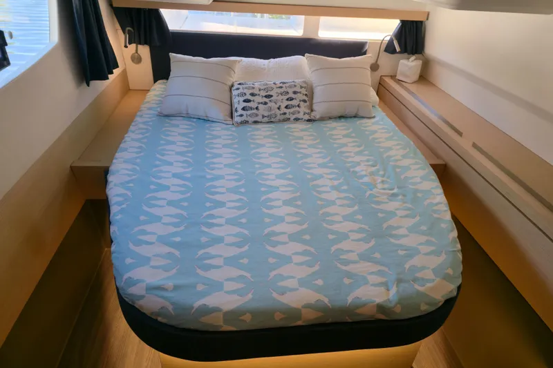Slide: The Image of Cozy bedroom in 2017 Fountaine Pajot Lucia 40 catamaran with nautical-themed bedding. - 81