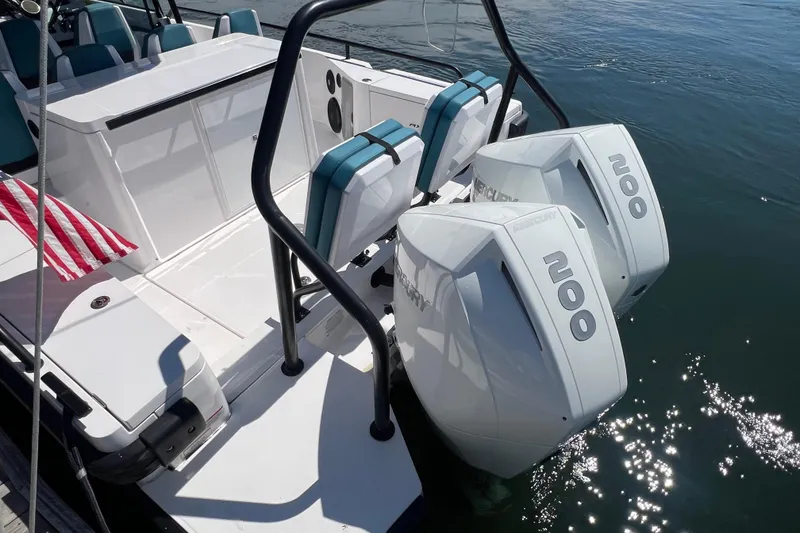 Slide: The Image of Axopar 28 boat, 2021 model, with twin 200 horsepower Mercury outboard engines. - 8