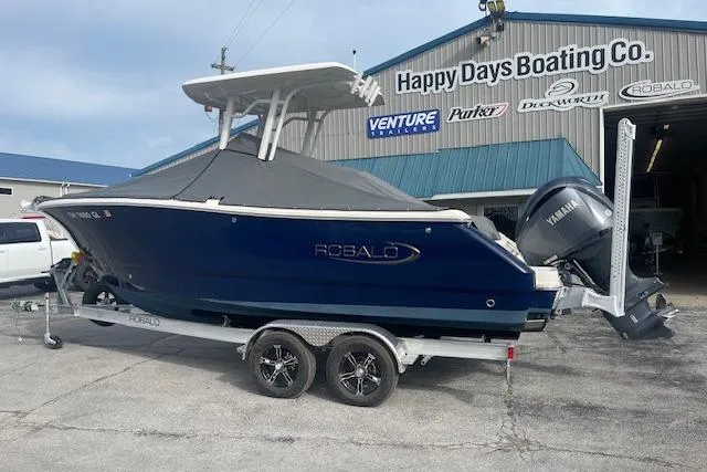 Slide: The Image of 2023 Robalo R230 Center Console boat on trailer at Happy Days Boating Co. - 3
