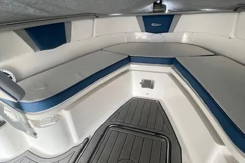 Slide: The Image of 2023 Robalo R230 Center Console boat interior with blue and white seating. - 4