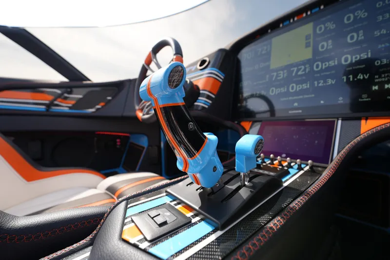 Slide: The Image of Interior of 2025 MTI 440X with advanced controls and digital dashboard display. - 35