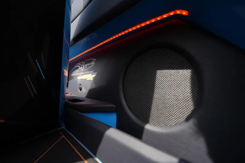 Slide: The Image of Interior of 2025 MTI 440X with sleek design and ambient lighting. - 37