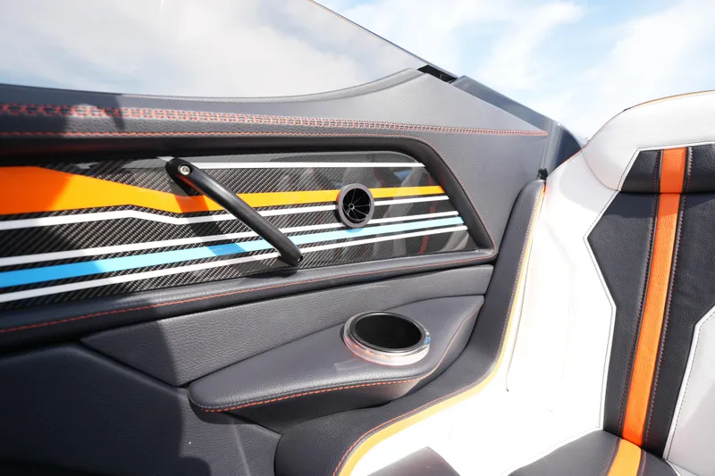 Slide: The Image of Interior of 2025 MTI 440X boat with sleek design and vibrant orange accents. - 40