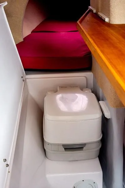 Slide: The Image of Compact marine toilet in 2010 Corsair Dash 750 sailboat cabin. - 10
