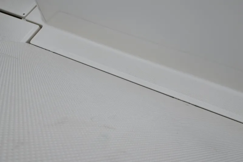 Slide: The Image of Close-up of the 2026 Bayliner Trophy T25 Pilothouse interior flooring. - 18