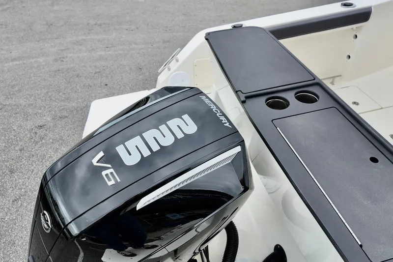 Slide: The Image of 2026 Bayliner Trophy T25 Pilothouse with Mercury V6 engine detail. - 6