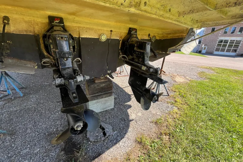 Slide: The Image of Rear view of 2000 Rinker 340 Fiesta Vee boat with dual outboard motors. - 3