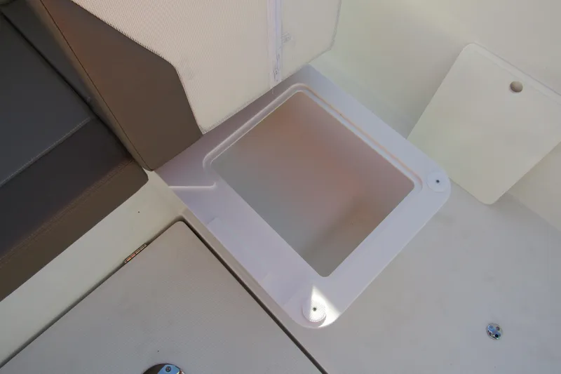 Slide: The Image of Storage compartment on 2025 Nimbus Tender 9 boat, featuring sleek design and practical seating. - 30